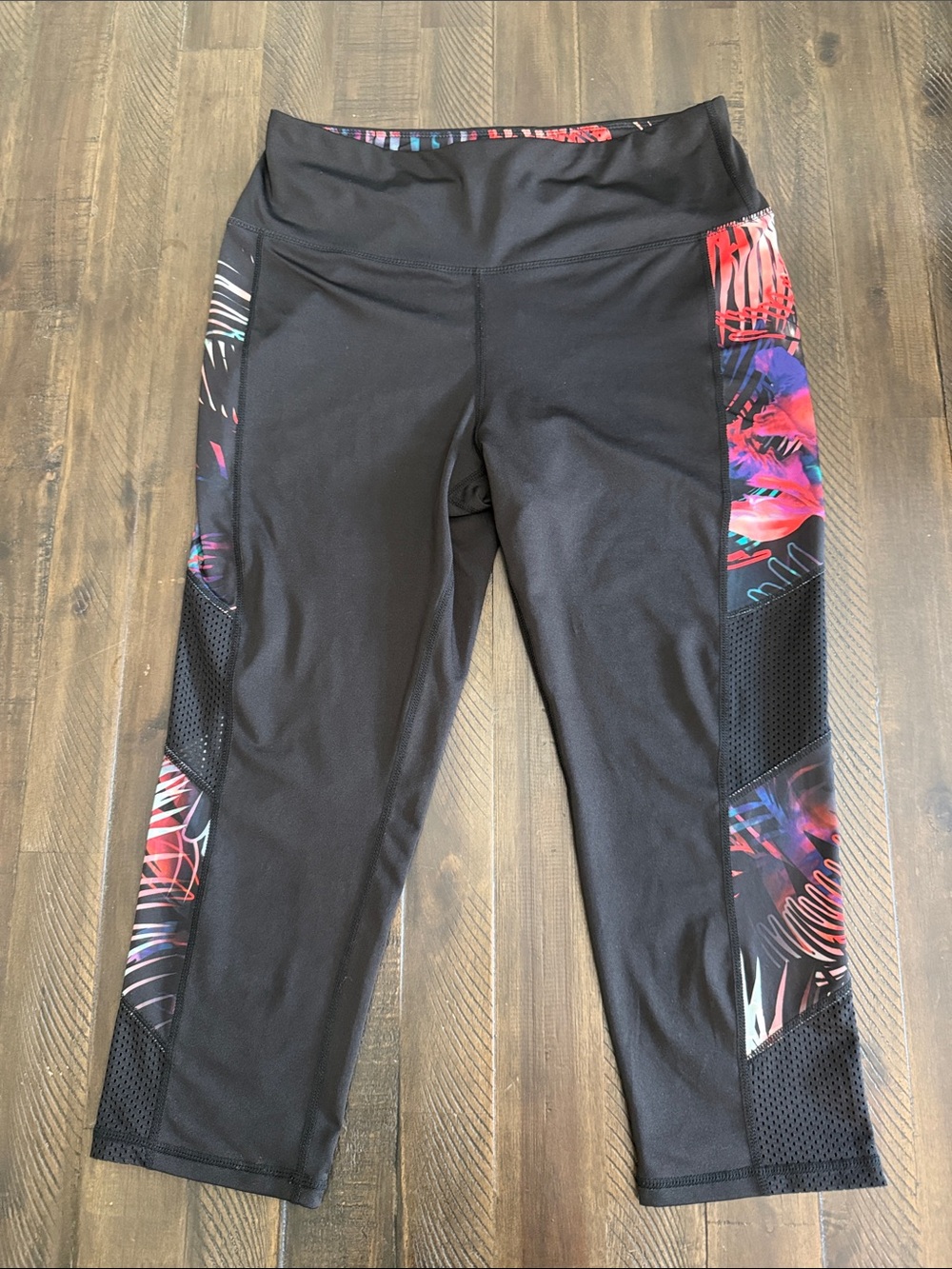 bebe Sport Black Capri Leggings with Neon Floral Side Panels